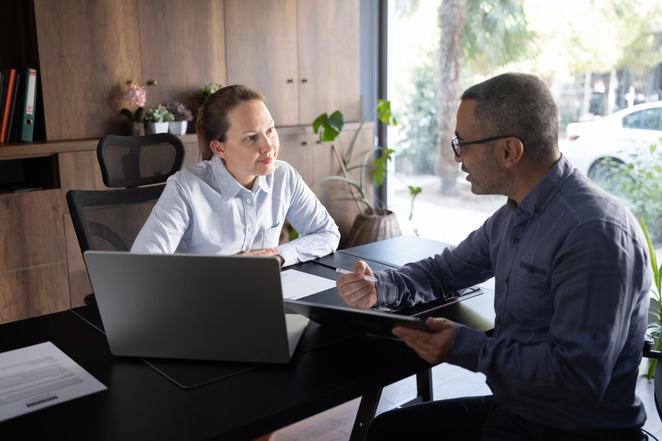 Advisor discussing financial plans with a client